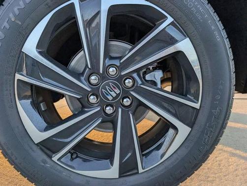 stone metallic 2026 Buick Enclave Sport Touring