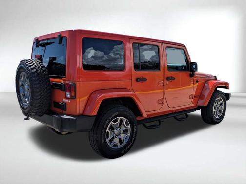 Orange 2015 Jeep Wrangler Unlimited Rubicon