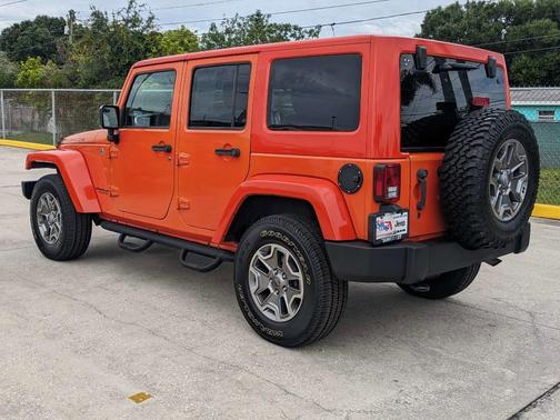 Orange 2015 Jeep Wrangler Unlimited Rubicon