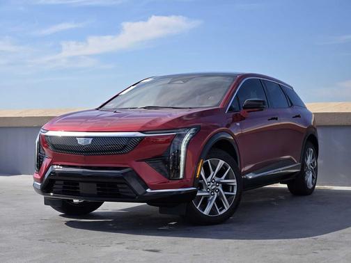 Radiant Red Tintcoat 2026 Cadillac OPTIQ Luxury