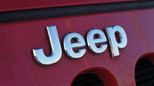 Photo 4 of 34 of 2014 Jeep Wrangler Sport