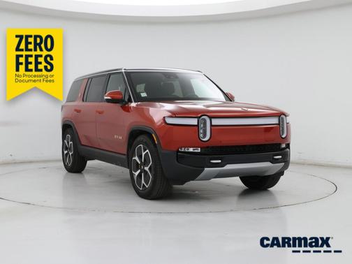 Orange 2024 Rivian R1S Adventure Quad-Motor Large