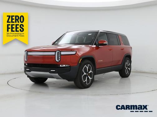 Orange 2024 Rivian R1S Adventure Quad-Motor Large