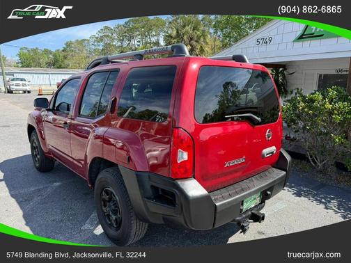 Red 2011 Nissan Xterra X