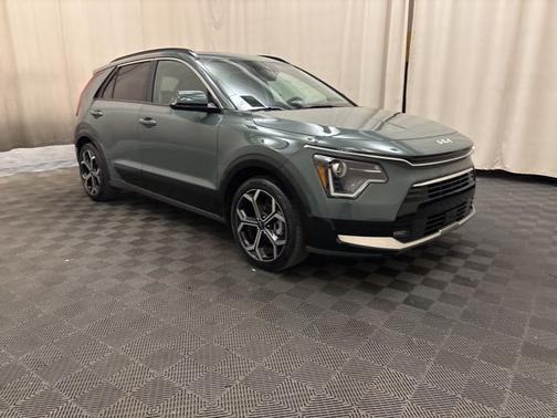 Cityscape Green 2023 Kia Niro EX Touring