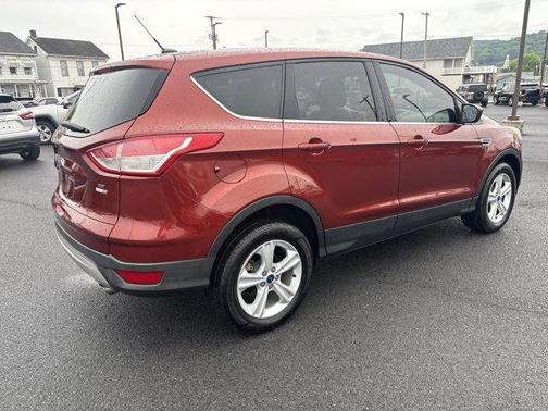 Orange 2016 Ford Escape SE