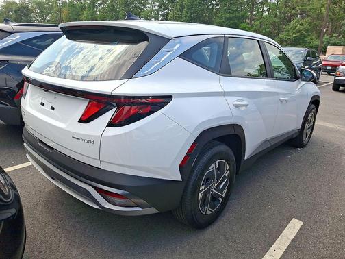 Creamy White Pearl 2026 Hyundai TUCSON Hybrid Blue SE