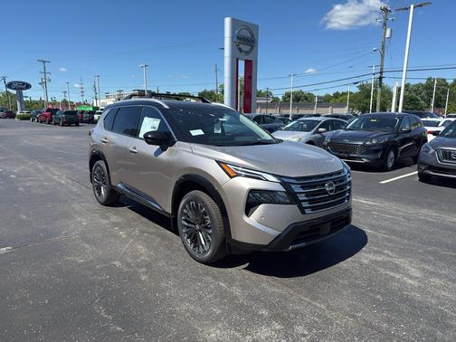 Champagne Silver Metallic/Super Black 2026 Nissan Rogue Platinum