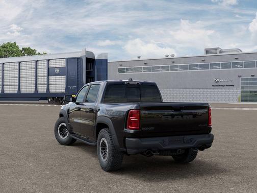 Diamond Black Crystal Pearlcoat 2026 RAM 1500 RHO Crew Cab 4x4 5'7' Box