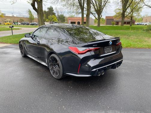 Black Sapphire Metallic 2024 BMW M4 Competition xDrive