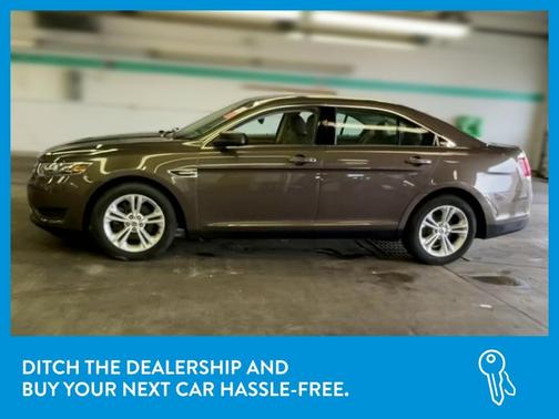 Photo 4 of 34 of 2015 Ford Taurus SE