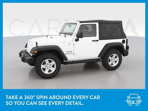 Photo 3 of 33 of 2014 Jeep Wrangler Sport
