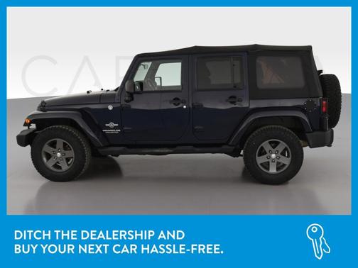 Photo 4 of 38 of 2012 Jeep Wrangler Unlimited Sport