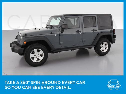 Photo 3 of 38 of 2014 Jeep Wrangler Unlimited Sport