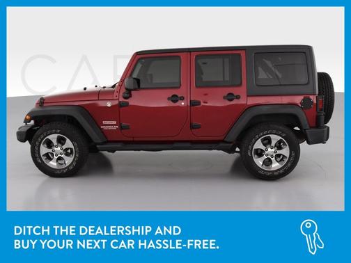 Photo 4 of 38 of 2012 Jeep Wrangler Unlimited Sport