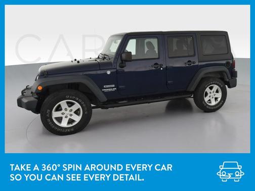 Photo 3 of 36 of 2013 Jeep Wrangler Unlimited Sport