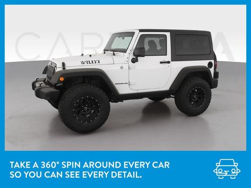 Photo 3 of 39 of 2014 Jeep Wrangler Sport