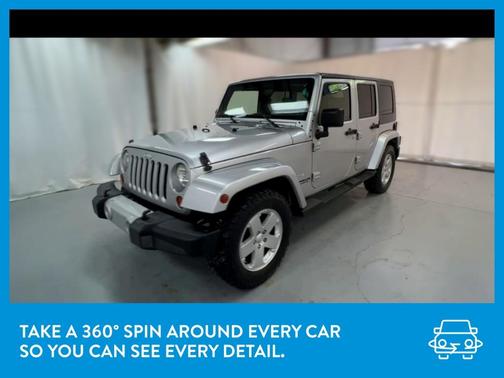 Photo 3 of 39 of 2010 Jeep Wrangler Unlimited Sahara