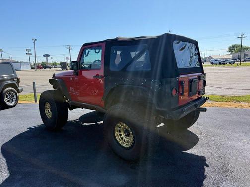 Red 2010 Jeep Wrangler Sport