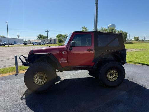 Red 2010 Jeep Wrangler Sport