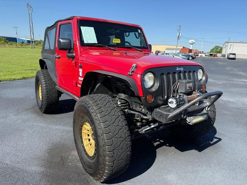 Red 2010 Jeep Wrangler Sport