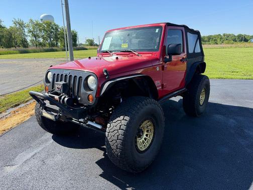 Red 2010 Jeep Wrangler Sport