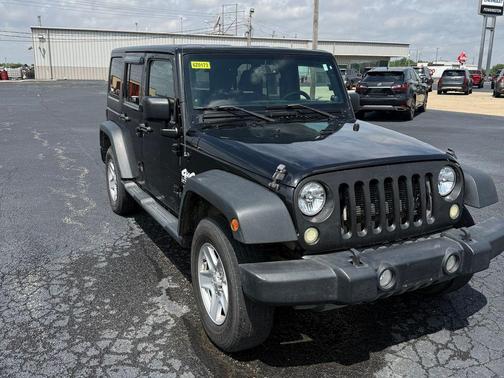 Black 2013 Jeep Wrangler Unlimited Sport