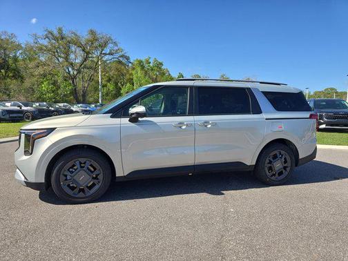 Ivory Silver 2026 Kia Carnival Hybrid EX