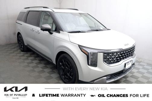 Ivory Silver 2026 Kia Carnival Hybrid SX