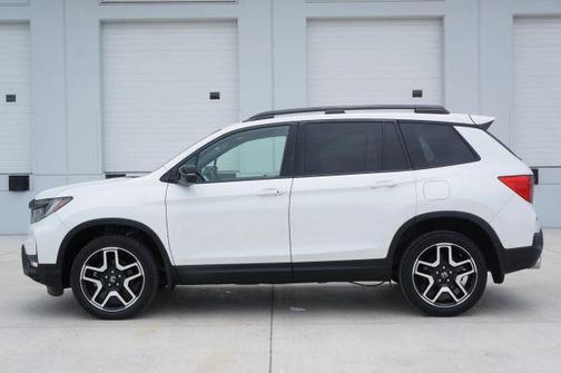 White 2023 Honda Passport Elite
