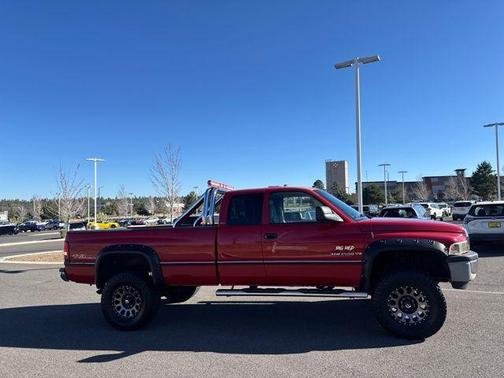 Red 1999 Dodge Ram 1500 Half Ton 4WD Conversion