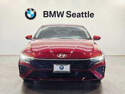 Ultimate Red Metallic 2024 Hyundai ELANTRA HEV Blue