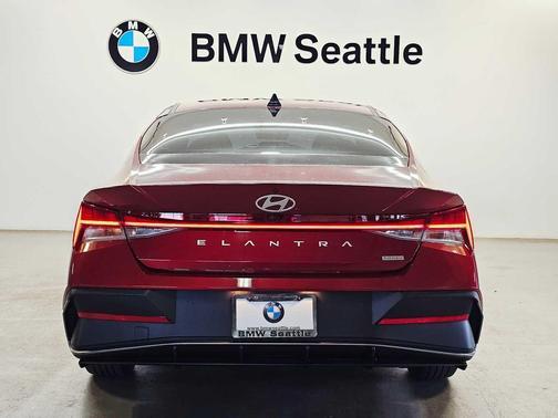 Ultimate Red Metallic 2024 Hyundai ELANTRA HEV Blue