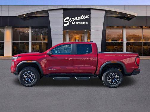 Volcanic Red Tintcoat 2024 GMC Canyon AT4X