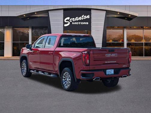 Volcanic Red Tintcoat 2023 GMC Sierra 1500 AT4