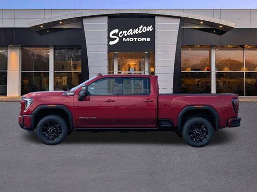 Volcanic Red Tintcoat 2026 GMC Sierra 2500 AT4