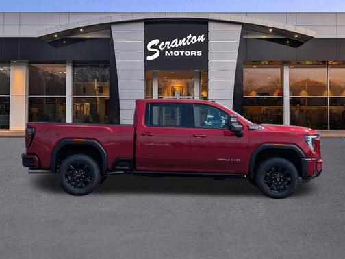 Volcanic Red Tintcoat 2026 GMC Sierra 2500 AT4