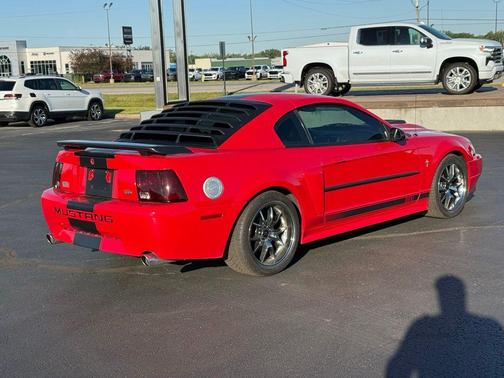 Red 2003 Ford Mustang Mach I