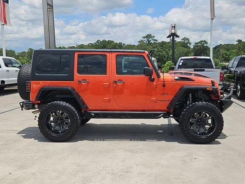 Sunset Orange 2015 Jeep Wrangler Unlimited Sport