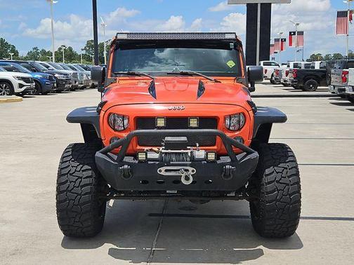 Sunset Orange 2015 Jeep Wrangler Unlimited Sport