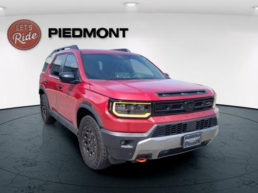 Radiant Red Metallic II 2026 Honda Passport TrailSport Blackout