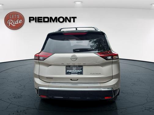 Champagne Silver Metallic/Super Black 2025 Nissan Rogue Platinum