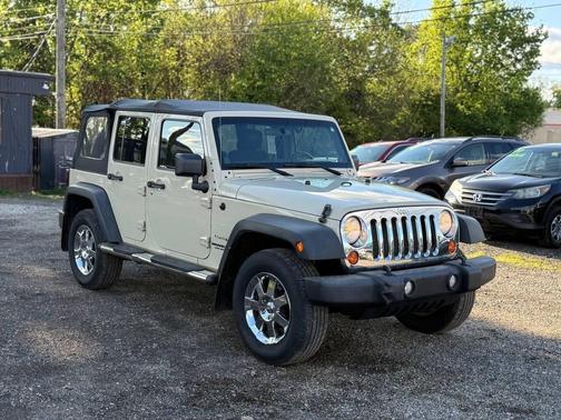 Beige 2011 Jeep Wrangler Unlimited Sport