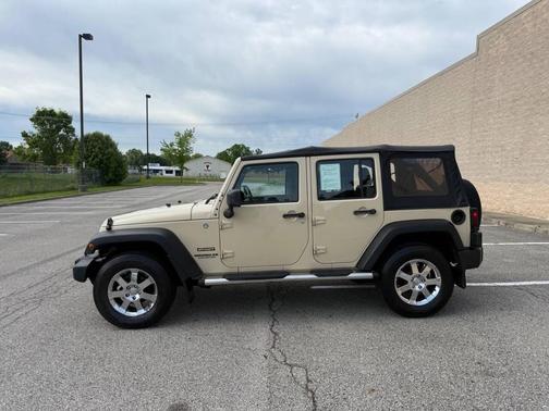 Beige 2011 Jeep Wrangler Unlimited Sport