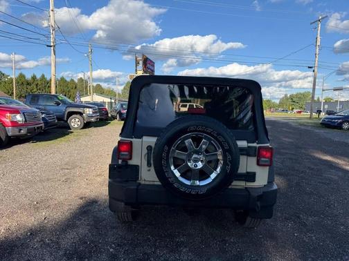 Beige 2011 Jeep Wrangler Unlimited Sport