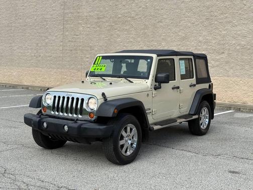 Beige 2011 Jeep Wrangler Unlimited Sport