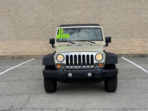 Beige 2011 Jeep Wrangler Unlimited Sport