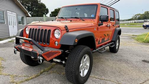 Sunset Orange Pearlcoat 2015 Jeep Wrangler Unlimited Sport