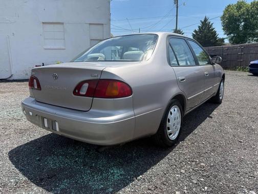 Tan 1999 Toyota Corolla CE