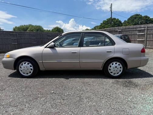 Tan 1999 Toyota Corolla CE